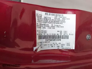 2006 Ford Focus SE with VIN 1FAFP36N76W133098, listed as a IAAI auction lot 41847337 with 117,371 mi miles. Bid and sale history available at carsss.com. Image 9.