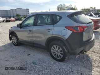 2015 Mazda CX-5 Sport with VIN JM3KE2BE2F0445810, listed as a Copart auction lot 65672555 with 218,675 mi miles and Clean title. Bid and sale history available at DreamBid. Image 2.