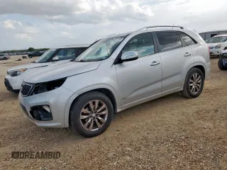 2012 Kia Sorento SX with VIN 5XYKWDA29CG262015, listed as a Copart auction lot 64677315 with 137,596 mi miles and Salvage title. Bid and sale history available at DreamBid. Image 1.