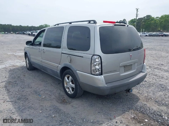 2005 Pontiac Montana SV6 w/1SB Pkg with VIN 1GMDV33L45D167273, listed as a IAAI auction lot 41973662 with 148,021 mi miles. Bid and sale history available at carsss.com. Image 3.