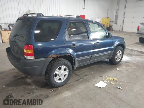 2003 Ford Escape XLT Popular with VIN 1FMYU03103KA06087, listed as a IAAI auction lot 42596326 with 210,441 mi miles and . Bid and sale history available at DreamBid. Image 4.