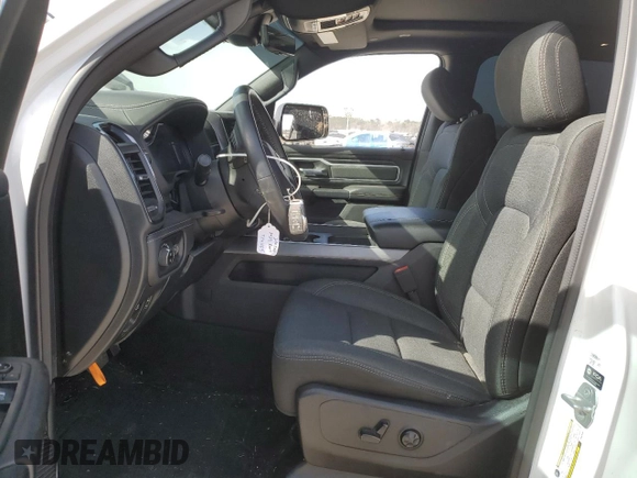 2023 Ram 1500 Limited with VIN 1C6SRFHT1PN576104, listed as a Copart auction lot 48064355 with 23,874 mi miles and Salvage title. Bid and sale history available at DreamBid. Image 7.