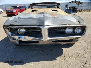 1968 Pontiac Firebird z VIN 223678U111281, wystawiony jako Copart lot #47306295 z przebiegiem Nie podano mil oraz Szkoda całkowita • Salvage title. Historia ofert i sprzedaży dostępna na DreamBid. Obrazek 5.