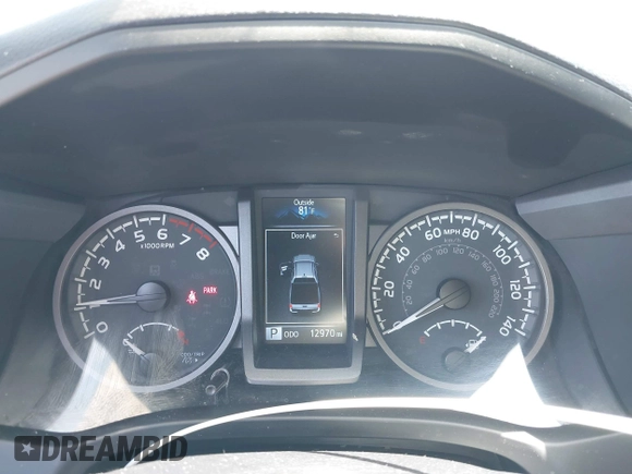 2023 Toyota Tacoma SR with VIN 3TMCZ5AN3PM590101, listed as a IAAI auction lot 42338670 with 12,970 mi miles and . Bid and sale history available at DreamBid. Image 7.