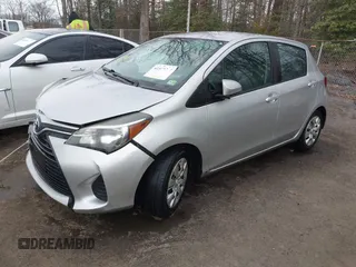 2015 Toyota Yaris L with VIN VNKKTUD33FA028588, listed as a IAAI auction lot 41575230 with 148,071 mi miles. Bid and sale history available at carsss.com. Image 17.