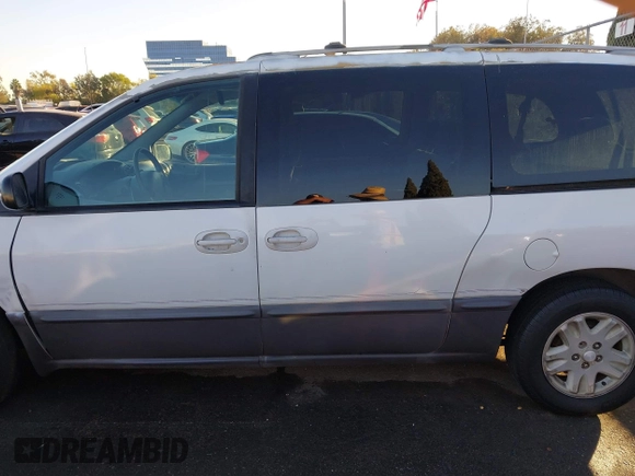 1996 Dodge Grand Caravan with VIN 1B4GP54R7TB387779, listed as a IAAI auction lot 41145400 with 175,662 mi miles and . Bid and sale history available at DreamBid. Image 14.