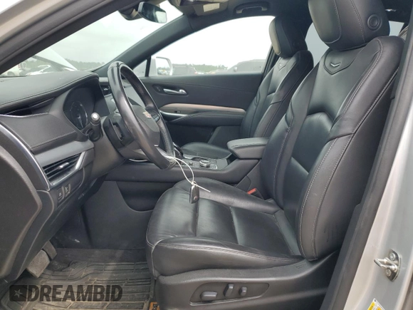 2021 Cadillac XT4 FWD Premium Luxury with VIN 1GYFZCR41MF002411, listed as a Copart auction lot 49746855 with 81,938 mi miles and Salvage title. Bid and sale history available at DreamBid. Image 7.