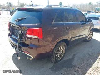 2011 Kia Sorento SX with VIN 5XYKWDA28BG122133, listed as a IAAI auction lot 41973379 with 185,627 mi miles. Bid and sale history available at carsss.com. Image 4.