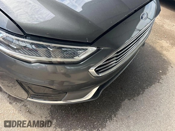 2020 Ford Fusion SEL with VIN 3FA6P0CD7LR197568, listed as a IAAI auction lot 42725343 with 111,304 mi miles and . Bid and sale history available at DreamBid. Image 9.
