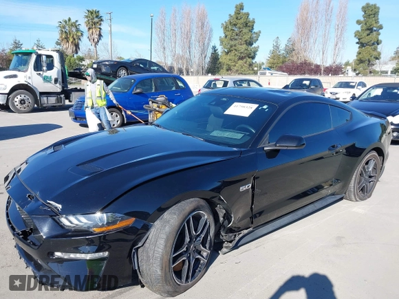 2021 Ford Mustang GT z VIN 1FA6P8CF6M5149175, wystawiony jako IAAI lot #41798328 z przebiegiem 61 776 mil mil oraz . Historia ofert i sprzedaży dostępna na DreamBid. Obrazek 6.