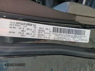 2012 Dodge Durango Crew with VIN 1C4RDHDG3CC265631, listed as a Copart auction lot 53474095 with 187,745 mi miles and Salvage Title. Bid and sale history available at DreamBid. Image 14.