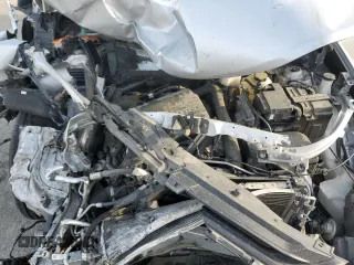 2020 Chevrolet Equinox LS z VIN 2GNAXHEV6L6171261, wystawiony jako Copart lot #49866745 z przebiegiem 218 045 mil mil oraz Szkoda całkowita • Salvage title. Historia ofert i sprzedaży dostępna na DreamBid. Obrazek 14.