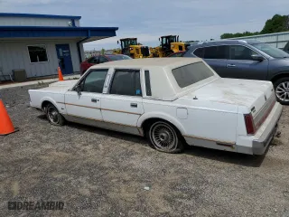 1989 Lincoln Town Car with VIN 1LNBM81F1KY658361, listed as a Copart auction lot 58558244 with 85,349 mi miles and Non Repairable. Bid and sale history available at carsss.com. Image 2.
