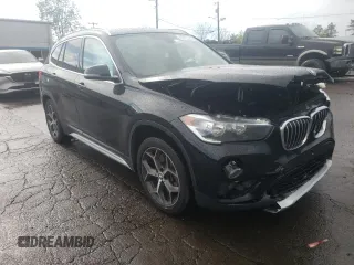 2018 BMW X1 xDrive28i with VIN WBXHT3C35J3H30946, listed as a Copart auction lot 55927505 with 69,626 mi miles and Salvage title. Bid and sale history available at DreamBid. Image 4.