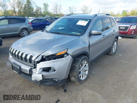 2014 Jeep Cherokee Latitude z VIN 1C4PJMCSXEW294950, wystawiony jako IAAI lot #42179152 z przebiegiem 105 796 mil mil oraz . Historia ofert i sprzedaży dostępna na DreamBid. Obrazek 2.
