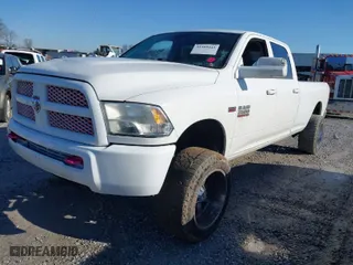 2018 Ram 2500 Tradesman with VIN 3C6UR5HJ0JG216906, listed as a IAAI auction lot 41409441 with 122,401 mi miles. Bid and sale history available at carsss.com. Image 2.