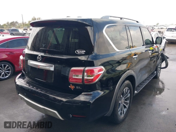 2018 Nissan Armada SL with VIN JN8AY2ND8JX000460, listed as a IAAI auction lot 41878921 with 143,454 mi miles and . Bid and sale history available at DreamBid. Image 4.