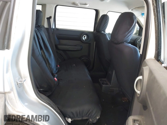 2007 Dodge Nitro SXT z VIN 1D8GT28K17W615978, wystawiony jako IAAI lot #41955211 z przebiegiem 142 741 mil mil oraz . Historia ofert i sprzedaży dostępna na DreamBid. Obrazek 8.