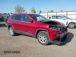 2016 Jeep Cherokee Latitude with VIN 1C4PJMCS8GW250318, listed as a IAAI auction lot 42126241 with 105,028 mi miles. Bid and sale history available at carsss.com. Image 1.