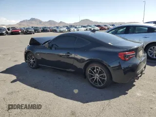 2017 Toyota 86 с VIN JF1ZNAA11H8703552, выставлен на аукционе Copart как лот 56208805 с пробегом 92 854 миль миль и Списание • Salvage title. История ставок и продаж доступна на DreamBid. Изображение 2.