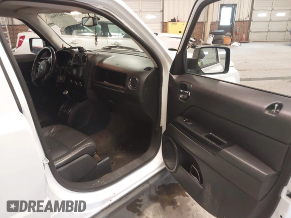 2014 Jeep Patriot Latitude with VIN 1C4NJPFA3ED739925, listed as a IAAI auction lot 41623546 with 130,374 mi miles and . Bid and sale history available at carsss.com. Image 5.