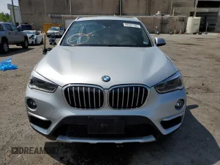 2016 BMW X1 xDrive28i with VIN WBXHT3Z31G4A51718, listed as a Copart auction lot 49331103 with 63,991 mi miles. Bid and sale history available at carsss.com. Image 5.