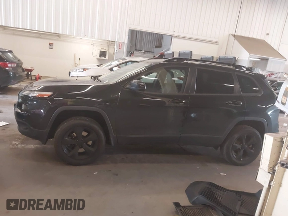 2016 Jeep Cherokee Latitude with VIN 1C4PJMCB2GW197454, listed as a IAAI auction lot 42289019 with 101,895 mi miles and . Bid and sale history available at DreamBid. Image 14.