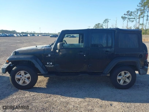 2007 Jeep Wrangler Unlimited X with VIN 1J4GA39127L159095, listed as a IAAI auction lot 41780974 with 179,791 mi miles. Bid and sale history available at carsss.com. Image 14.