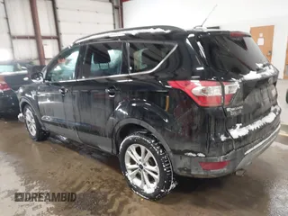 2017 Ford Escape SE with VIN 1FMCU9GD8HUE81307, listed as a IAAI auction lot 41386675 with 133,821 mi miles and . Bid and sale history available at DreamBid. Image 3.