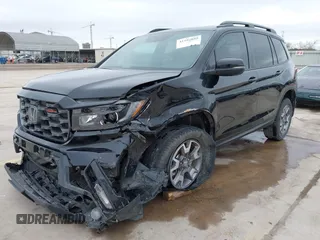 2023 Honda Passport TrailSport with VIN 5FNYF8H67PB006933, listed as a IAAI auction lot 41597859 with 34,145 mi miles and . Bid and sale history available at carsss.com. Image 2.