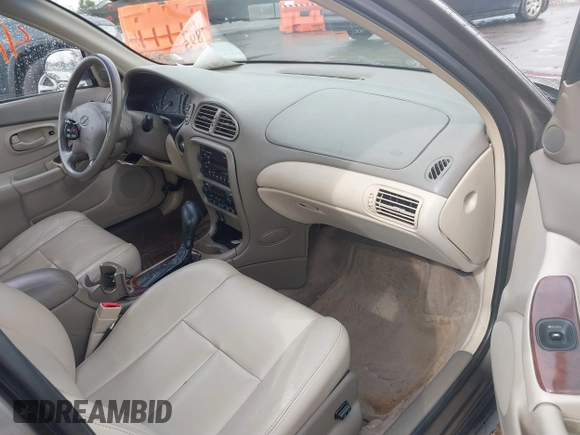 2000 Oldsmobile Intrigue GLS z VIN 1G3WX52H9YF131166, wystawiony jako IAAI lot #41527895 z przebiegiem 104 534 mil mil oraz . Historia ofert i sprzedaży dostępna na DreamBid. Obrazek 5.