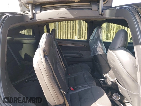 2022 Tesla Model X with VIN 7SAXCAE59NF346186, listed as a IAAI auction lot 41893923 with Not Provided miles and . Bid and sale history available at DreamBid. Image 7.