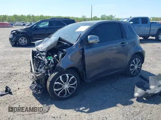 2012 Scion iQ z VIN JTNJJXB0XCJ013923, wystawiony jako IAAI lot #42109295 z przebiegiem 119 937 mil mil oraz . Historia ofert i sprzedaży dostępna na DreamBid. Obrazek 2.