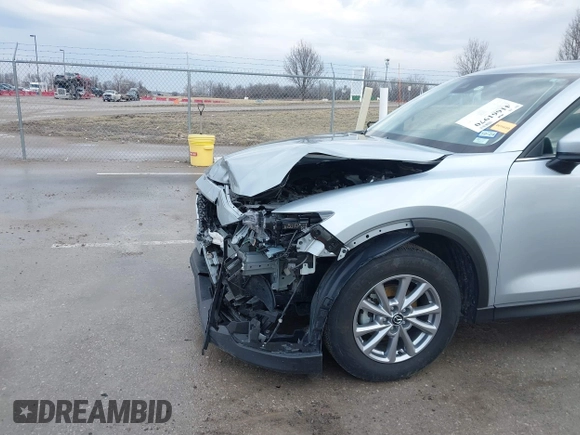2023 Mazda CX-5 S Preferred with VIN JM3KFBCM1P0131070, listed as a IAAI auction lot 41661970 with 31,910 mi miles and . Bid and sale history available at carsss.com. Image 6.