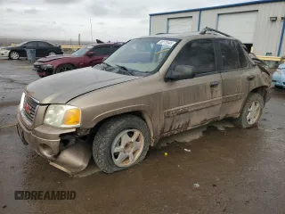 2003 GMC Envoy SLT with VIN 1GKDS13S432372114, listed as a Copart auction lot 88175945 with 114,138 mi miles and Salvage Title. Bid and sale history available at carsss.com. Image 1.