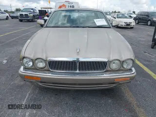 1997 Jaguar XJ with VIN SAJHX1243VC811786, listed as a IAAI auction lot 41451521 with Not provided miles and . Bid and sale history available at DreamBid. Image 6.