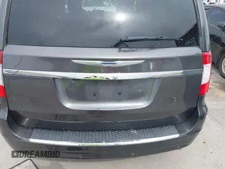 2014 Chrysler Town & Country Touring L with VIN 2C4RC1CG7ER300693, listed as a IAAI auction lot 41849463 with 174,203 mi miles and . Bid and sale history available at carsss.com. Image 18.