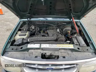 1999 Ford Explorer XL z VIN 1FMZU34X6XUC27678, wystawiony jako Copart lot #57073105 z przebiegiem 228 525 mil mil oraz Czysty tytuł • Clean title. Historia ofert i sprzedaży dostępna na DreamBid. Obrazek 12.