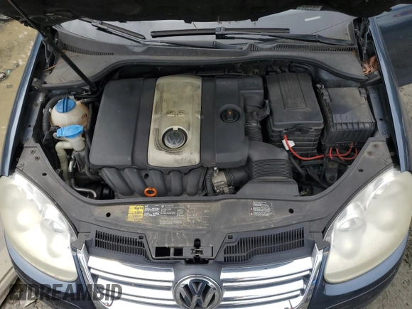 2005 Volkswagen Jetta 2.5L with VIN 3VWRG71K45M628981, listed as a Copart auction lot 58531595 with 128,217 mi miles and Salvage title. Bid and sale history available at DreamBid. Image 11.