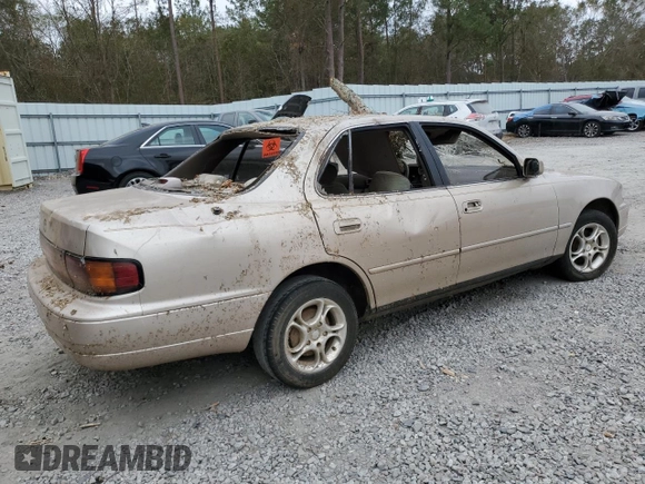 1993 Toyota Camry LE with VIN 4T1SK12E5PU316445, listed as a Copart auction lot 77534394 with 175,506 mi miles and Salvage Title. Bid and sale history available at carsss.com. Image 3.
