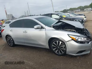 2018 Nissan Altima SR with VIN 1N4AL3AP6JC151861, listed as a IAAI auction lot 40010666 with 140,228 mi miles and . Bid and sale history available at DreamBid. Image 13.