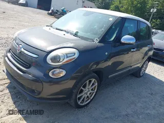 2014 FIAT 500L Lounge with VIN ZFBCFACHXEZ005568, listed as a IAAI auction lot 42802980 with 130,508 mi miles and . Bid and sale history available at DreamBid. Image 2.