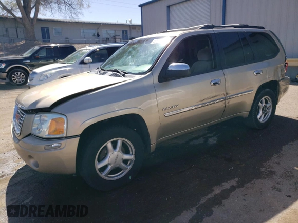 2006 GMC Envoy SLT with VIN 1GKDT13S662127817, listed as a Copart auction lot 50837674 with 165,398 mi miles and Salvage Title. Bid and sale history available at carsss.com. Image 1.