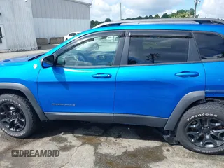2019 Jeep Cherokee Trailhawk z VIN 1C4PJMBX1KD336247, wystawiony jako IAAI lot #42646549 z przebiegiem 61 636 mil mil oraz . Historia ofert i sprzedaży dostępna na DreamBid. Obrazek 14.