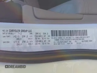 2014 Jeep Grand Cherokee Limited with VIN 1C4RJFBG7EC220677, listed as a IAAI auction lot 41177354 with 148,445 mi miles and . Bid and sale history available at DreamBid. Image 9.