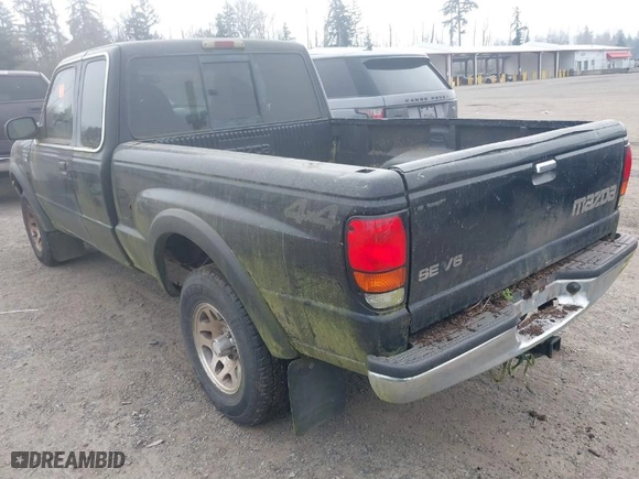 1999 Mazda B-Series 4WD Truck SE with VIN 4F4ZR17X5XTM17667, listed as a IAAI auction lot 41896804 with NaN miles. Bid and sale history available at carsss.com. Image 3.