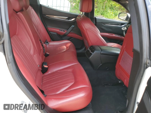 2018 Maserati Ghibli с VIN ZAM57XSA3J1296624, выставлен на аукционе Copart как лот 60810835 с пробегом 62 582 миль миль и Чистый • Clean title. История ставок и продаж доступна на DreamBid. Изображение 10.