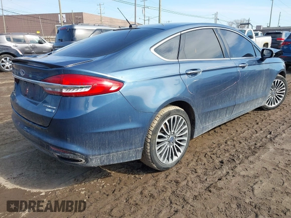 2018 Ford Fusion Titanium with VIN 3FA6P0D94JR187880, listed as a IAAI auction lot 41690869 with 120,214 mi miles and . Bid and sale history available at DreamBid. Image 4.