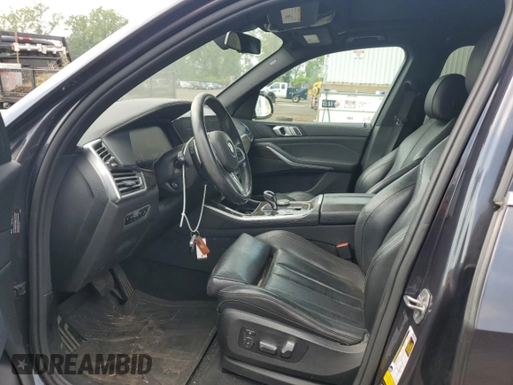 2019 BMW X5 xDrive40i with VIN 5UXCR6C57KLL11051, listed as a Copart auction lot 60268695 with 169,671 mi miles and Salvage title. Bid and sale history available at DreamBid. Image 7.