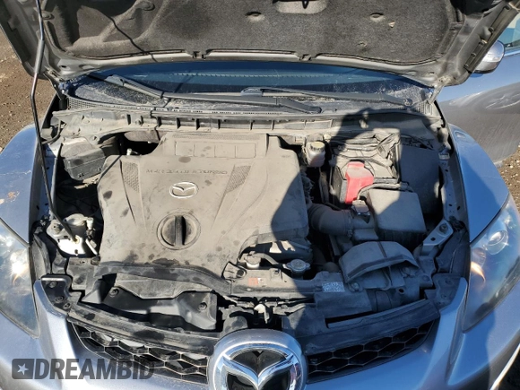 2011 Mazda CX-7 S Grand Touring z VIN JM3ER4D32B0379567, wystawiony jako Copart lot #79163864 z przebiegiem 142 292 mil mil oraz Czysty tytuł • Clean title. Historia ofert i sprzedaży dostępna na DreamBid. Obrazek 12.